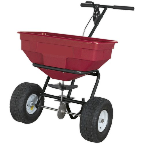 Walk behind broadcast spreader - walk,